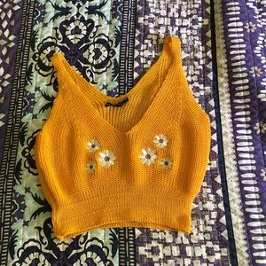 Yellow knitted tank with embroidered flowers